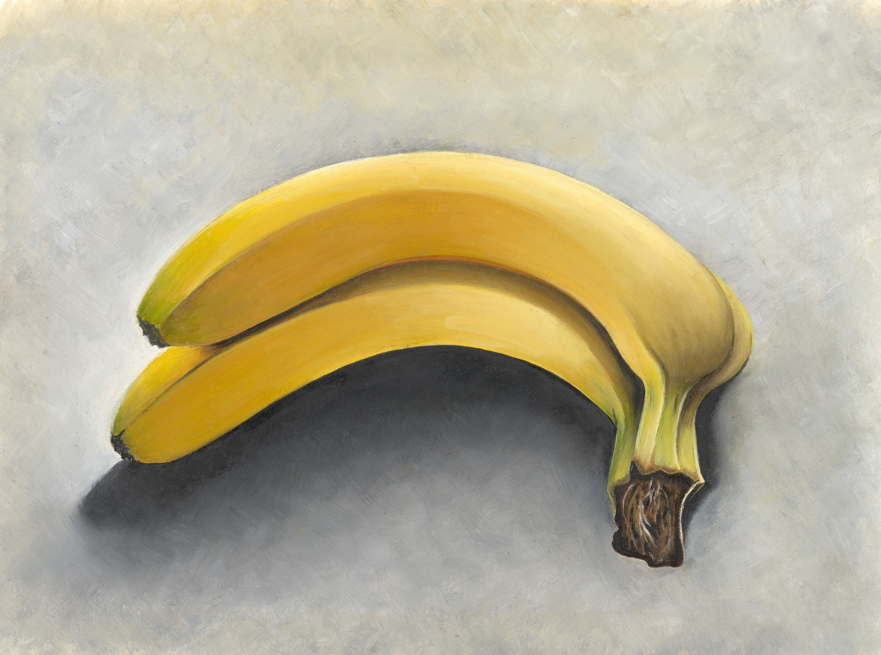Two yellow bananas casting a deep grey shadow on a softly textured pale background.